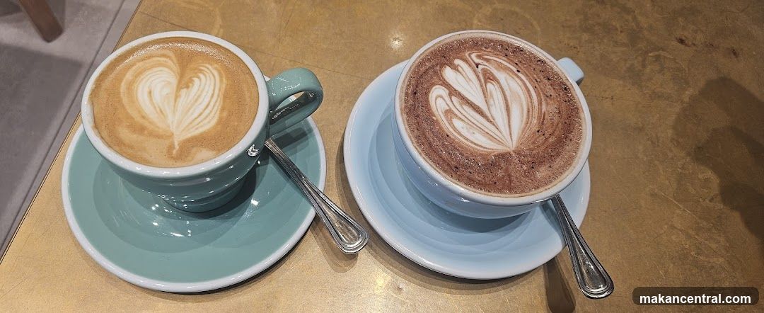 Two coffees with latte art