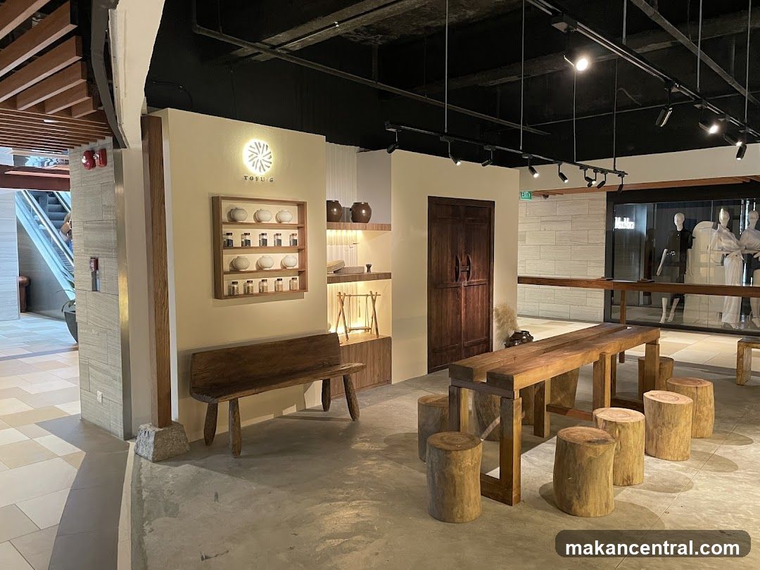Interior of a shop with rustic wooden furniture and display shelves