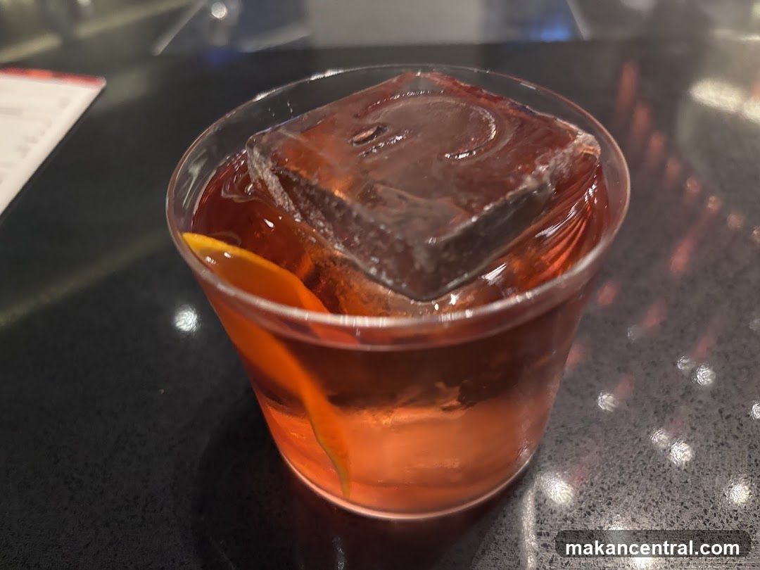 Cocktail with Ice and Orange Peel
