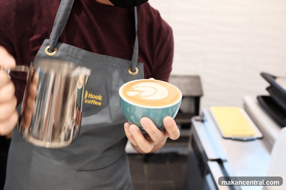 Barista making latte art