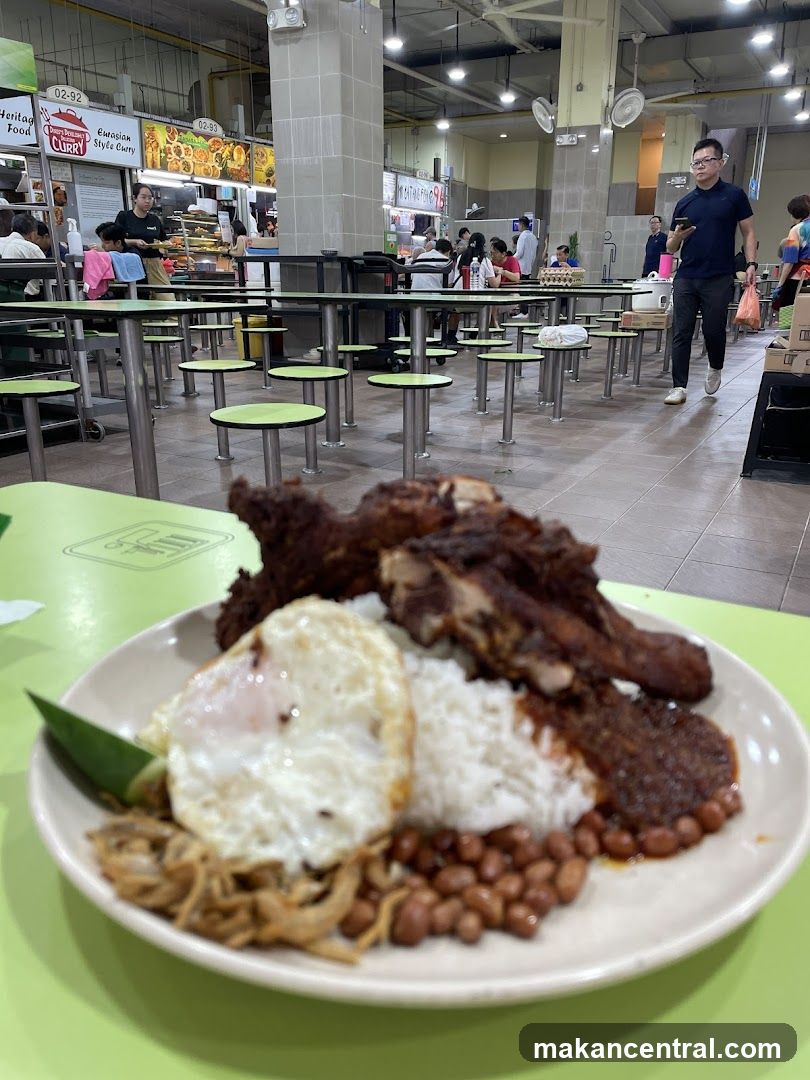 Food court with a plate of Nasi Lemak