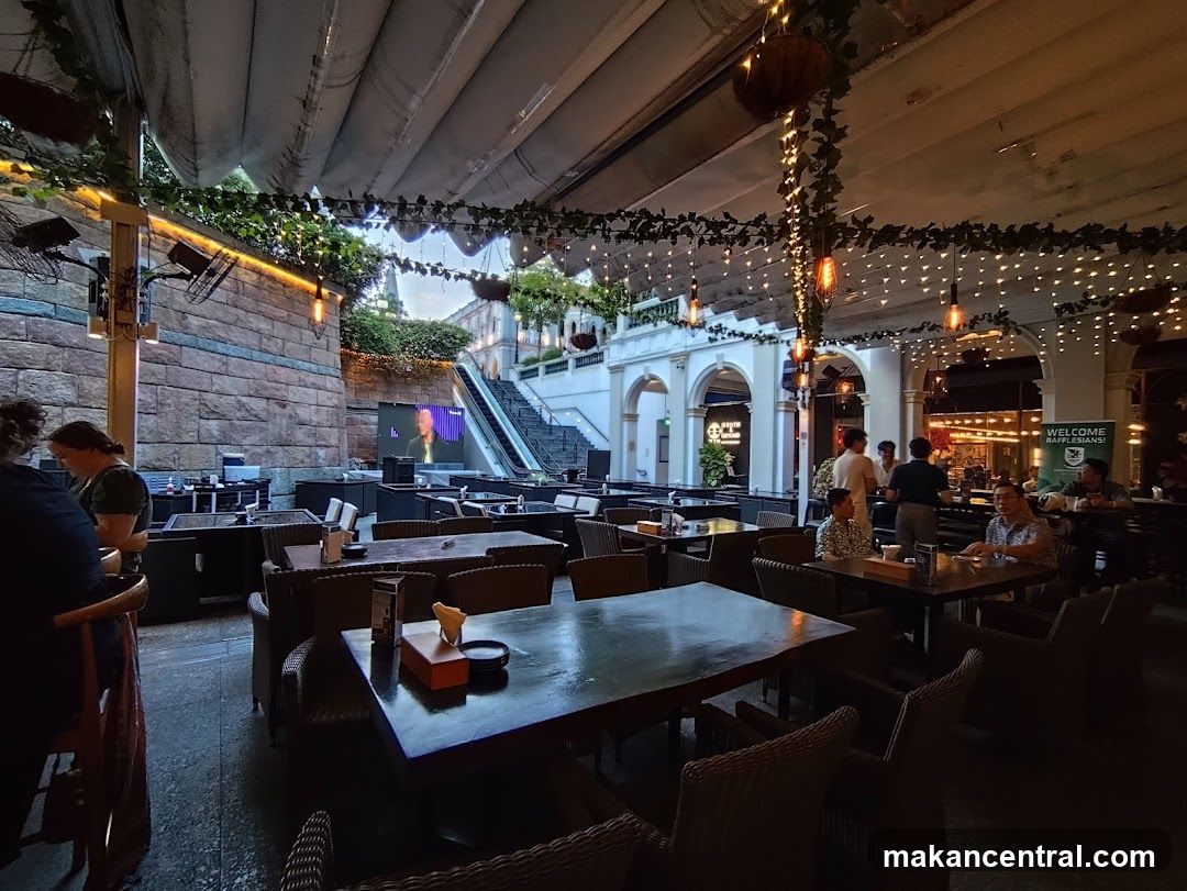 Outdoor Seating Area with People and Decorations