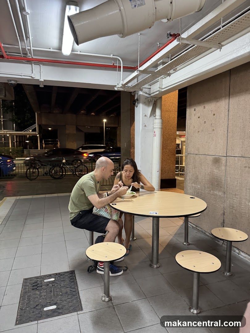Couple eating at outdoor table