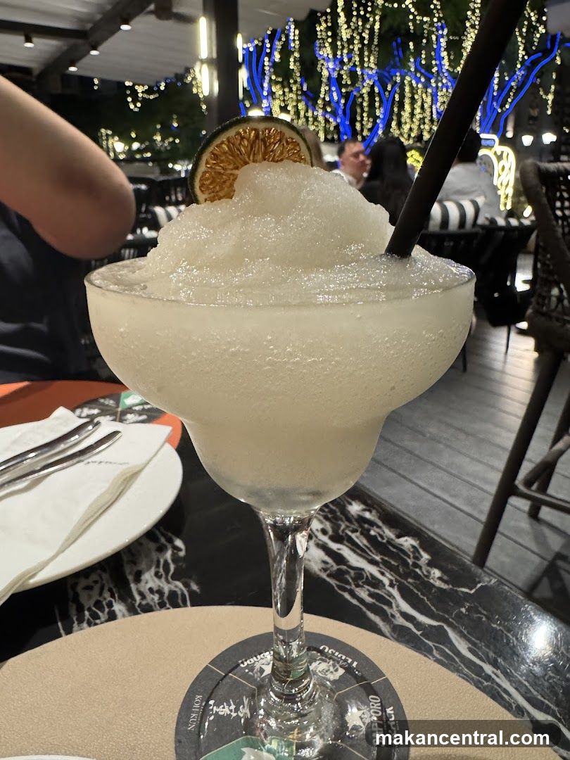 Frozen Cocktail with Lime Garnish