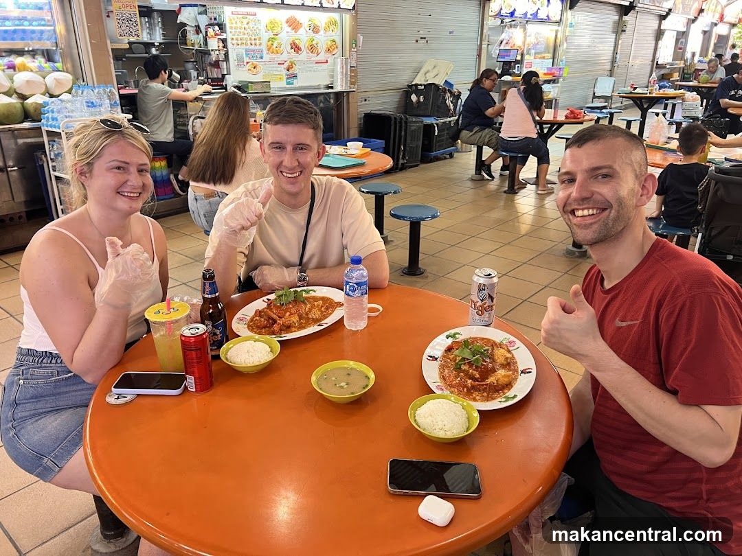 Friends Enjoying a Meal at an Outdoor Food Court
