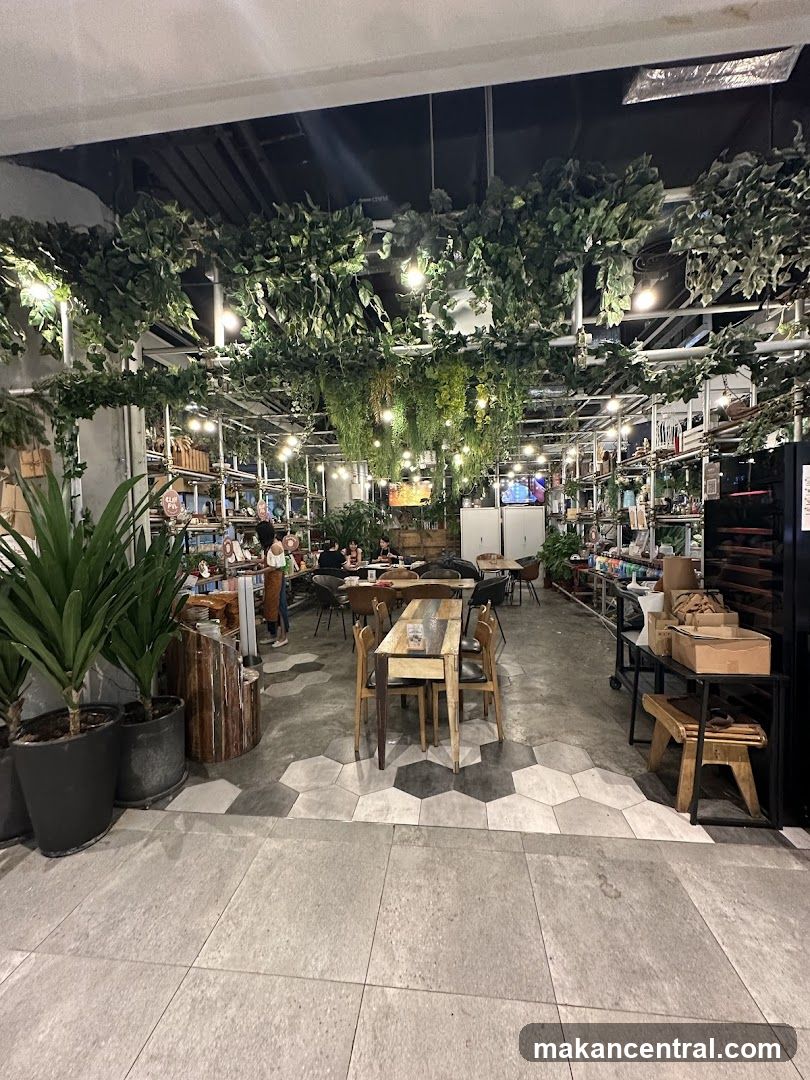 Indoor cafe with lush greenery