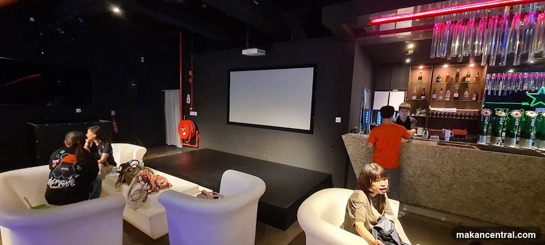 Bar Interior with Seating and Projector Screen