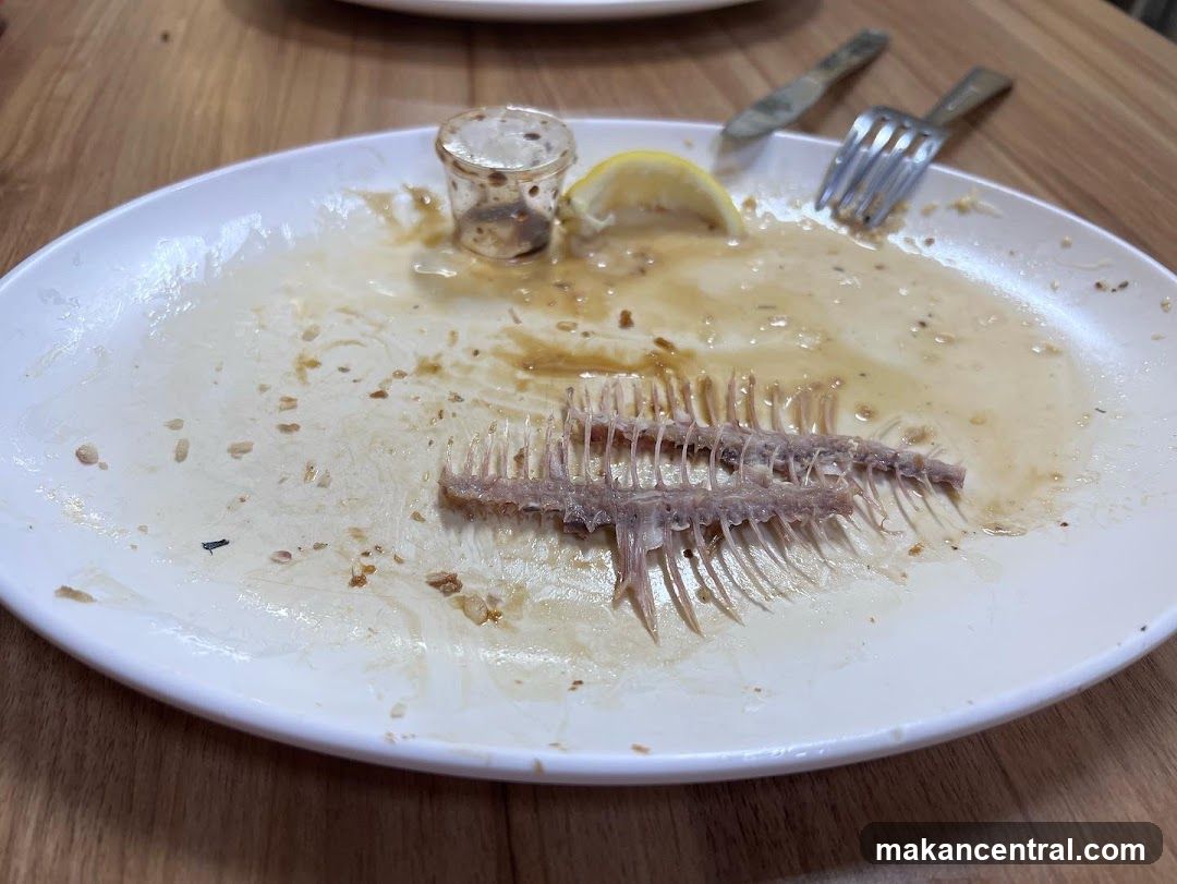 Dirty Plate with Fish Bones