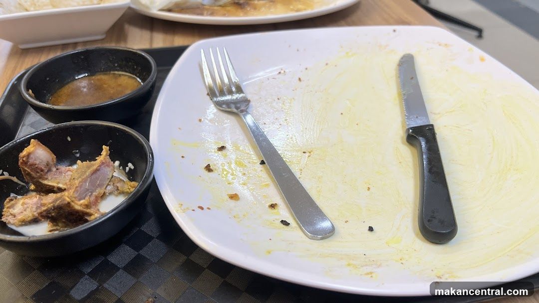 Messy Plate with Food Scraps