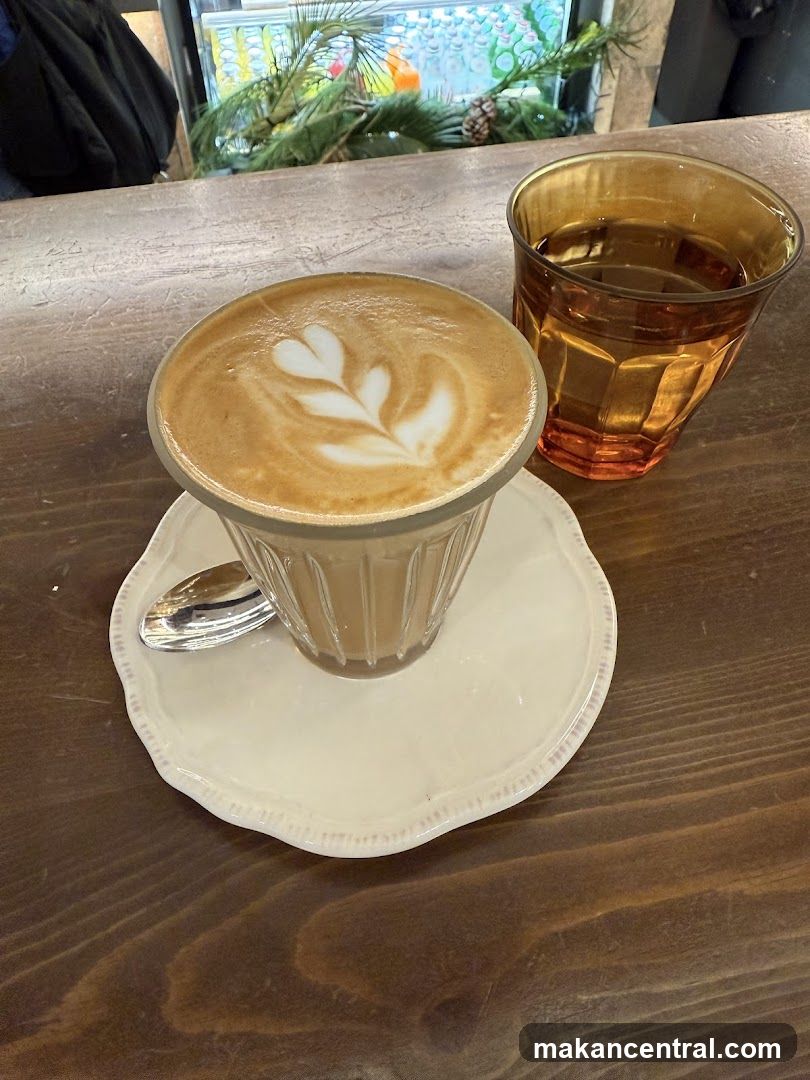 Latte with Latte Art and Water