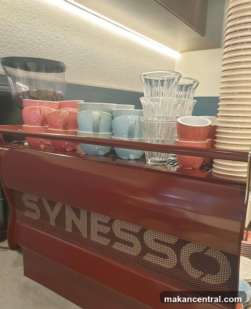Coffee cups and espresso machine