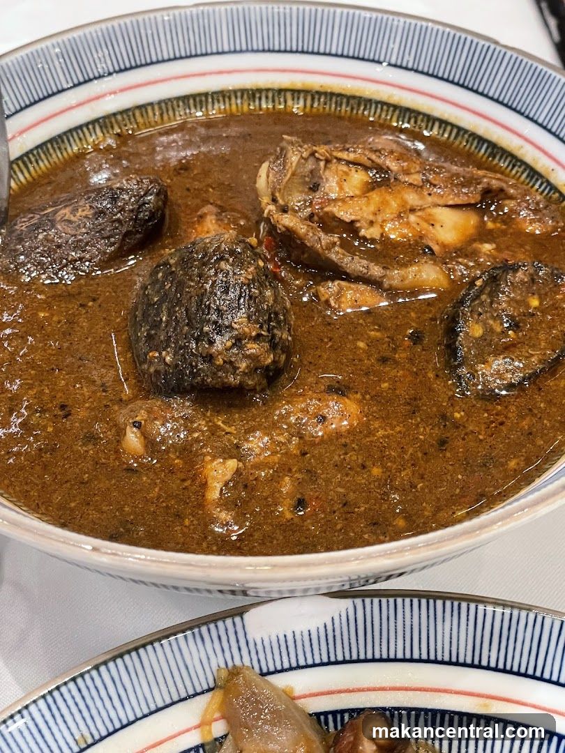 Bowl of Stew with Meat and Vegetables
