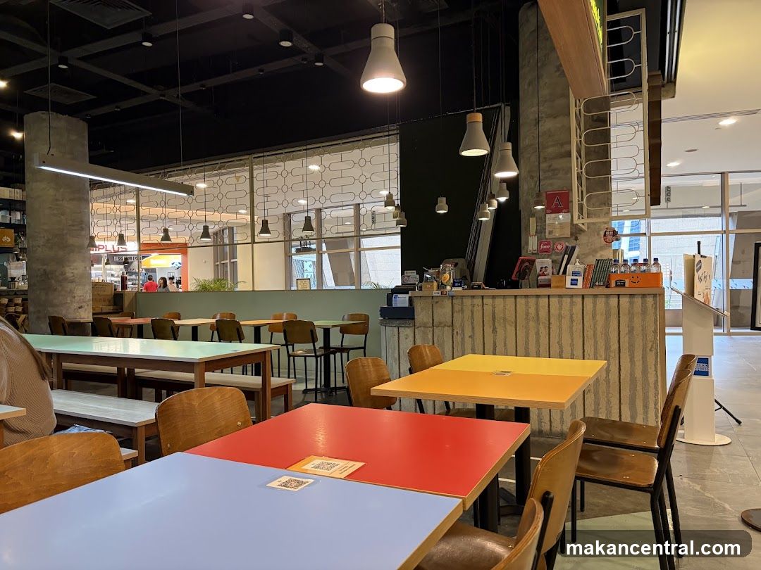 Modern Cafe Interior with Colorful Tables