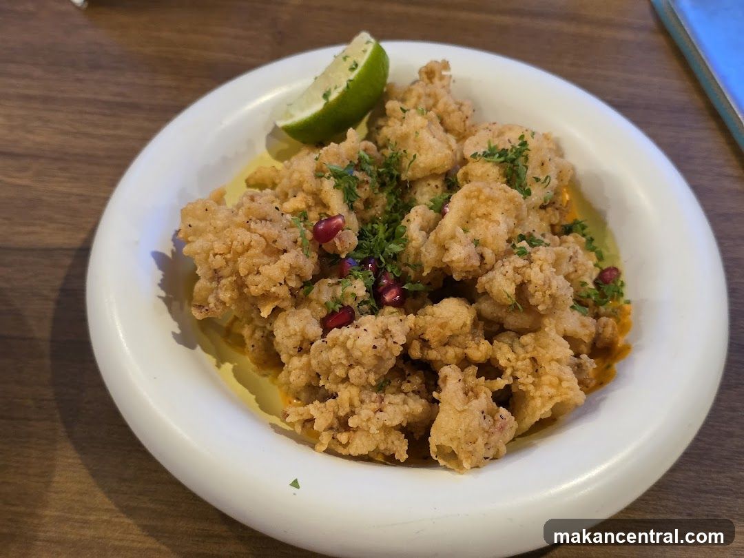 Fried Calamari with Lime and Pomegranate Seeds