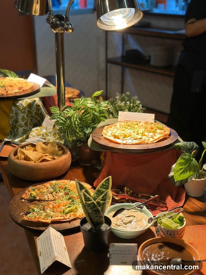 Buffet Spread with Pizzas and Dips