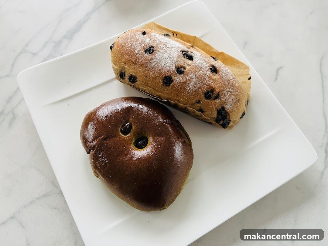 Two pastries on a white plate