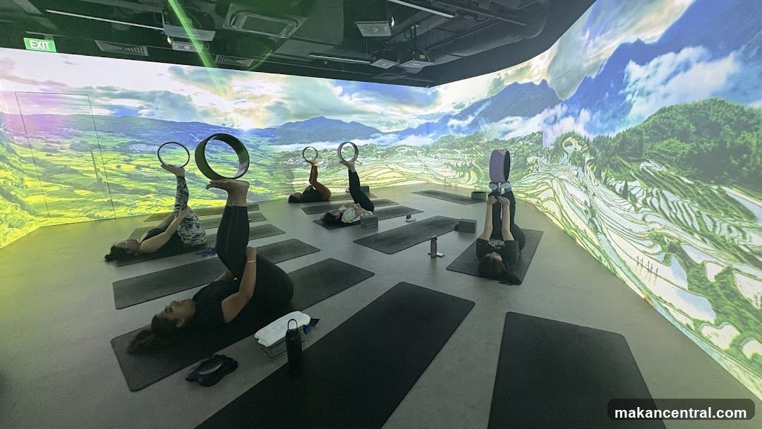 Yoga class with projected scenery