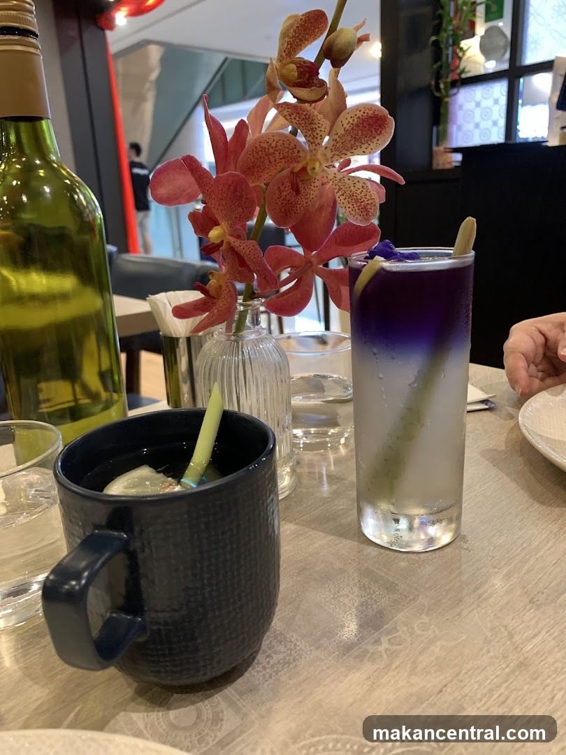 Table Setting with Drinks and Flowers
