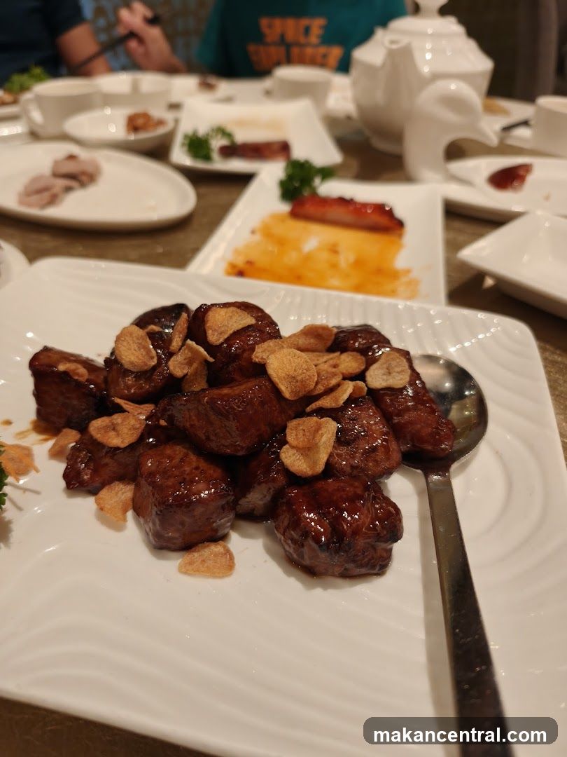 Gourmet Meat Dish with Crispy Garlic