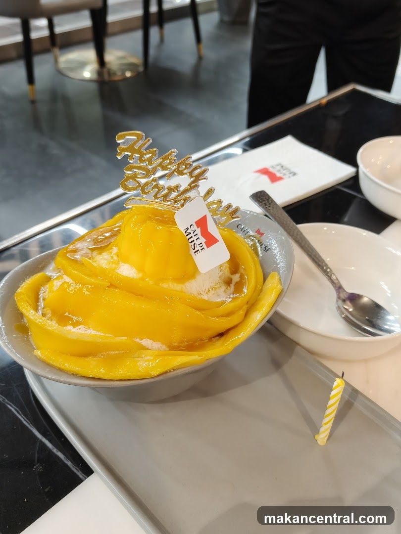 Mango dessert with birthday decoration