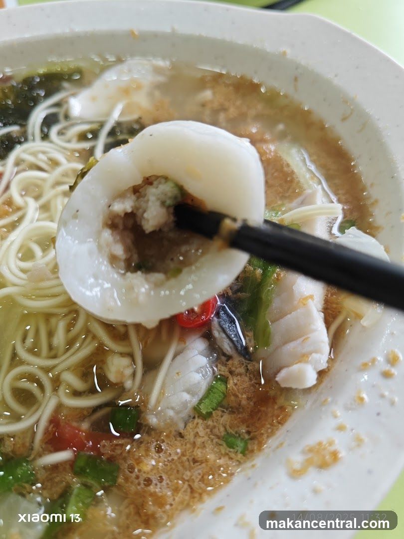 Close-up of noodle soup with seafood
