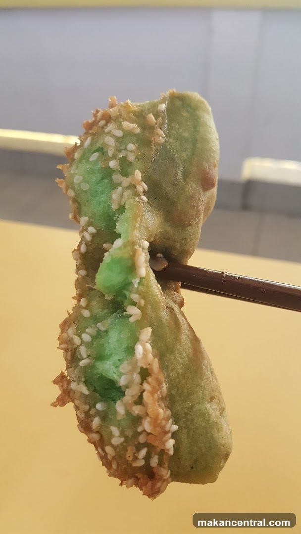 Food Item Held with Chopsticks