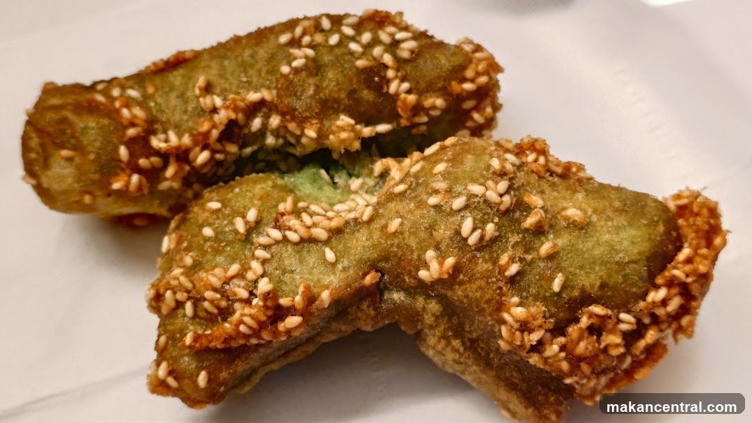 Fried Sesame-Dusted Food Item