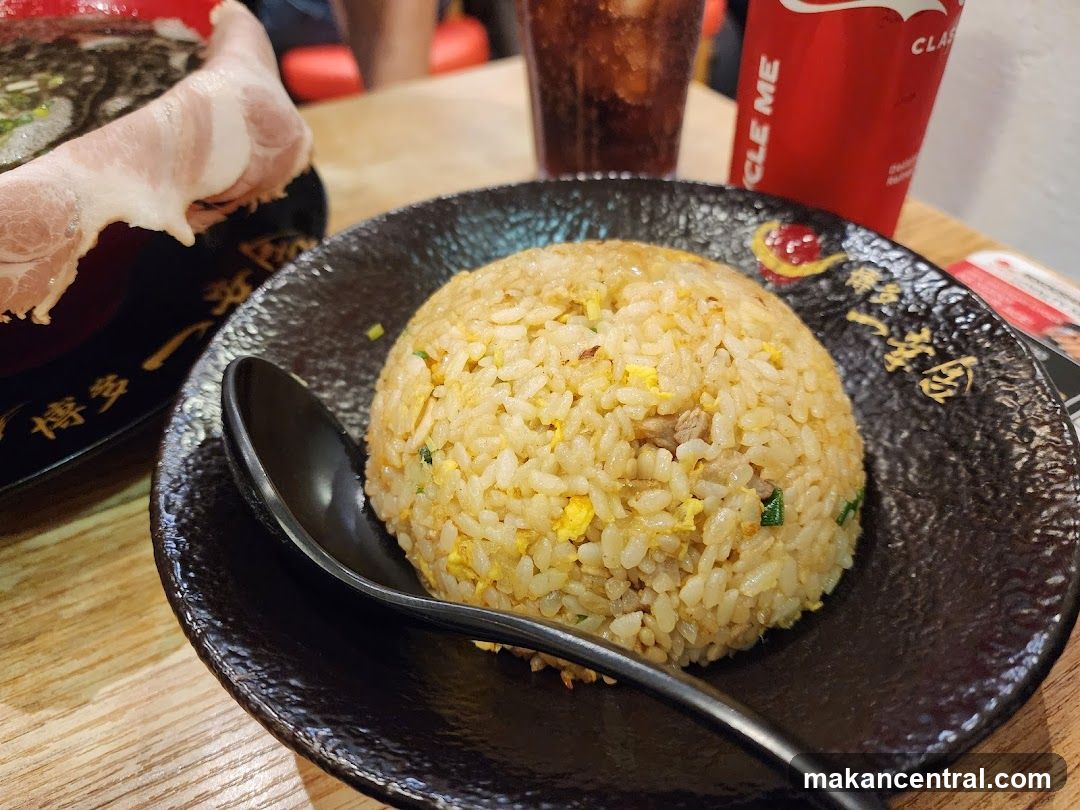 Fried Rice Dish with Beverage and Side Plate