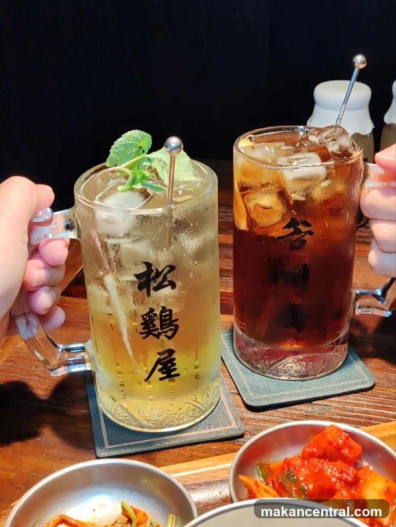 Two drinks with Korean characters on mugs