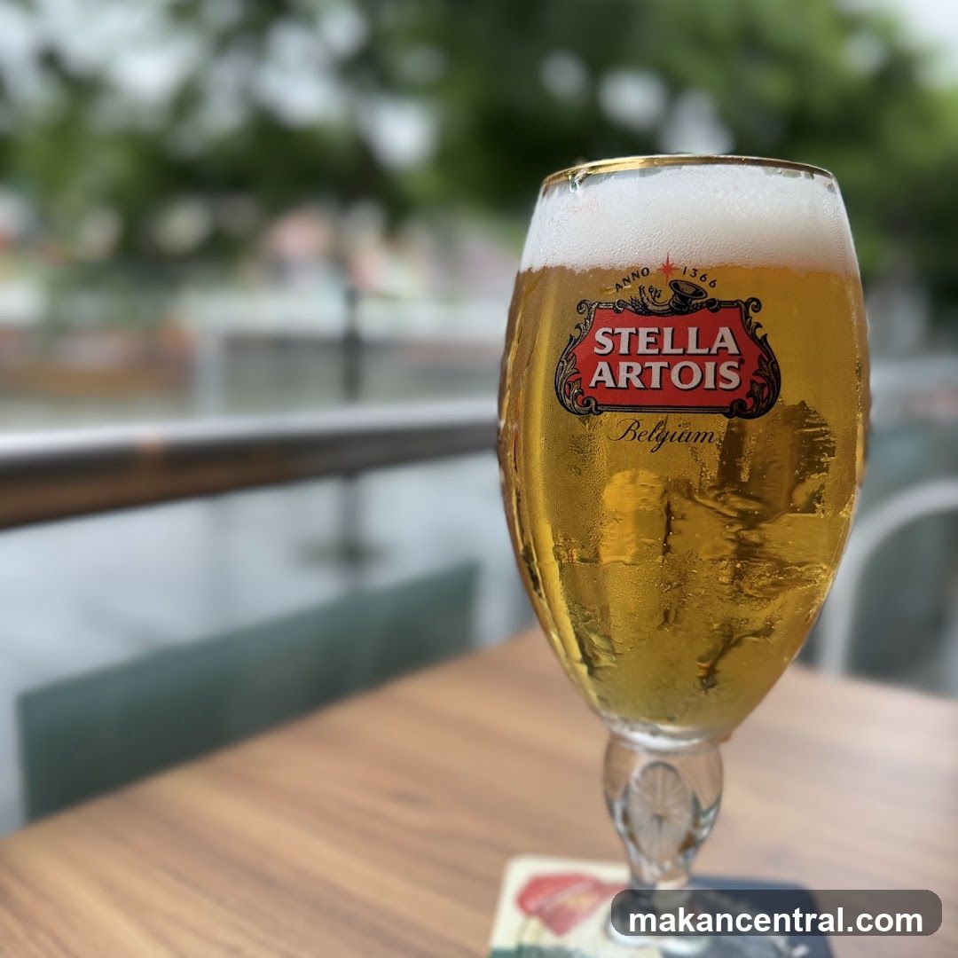 Stella Artois beer glass on table