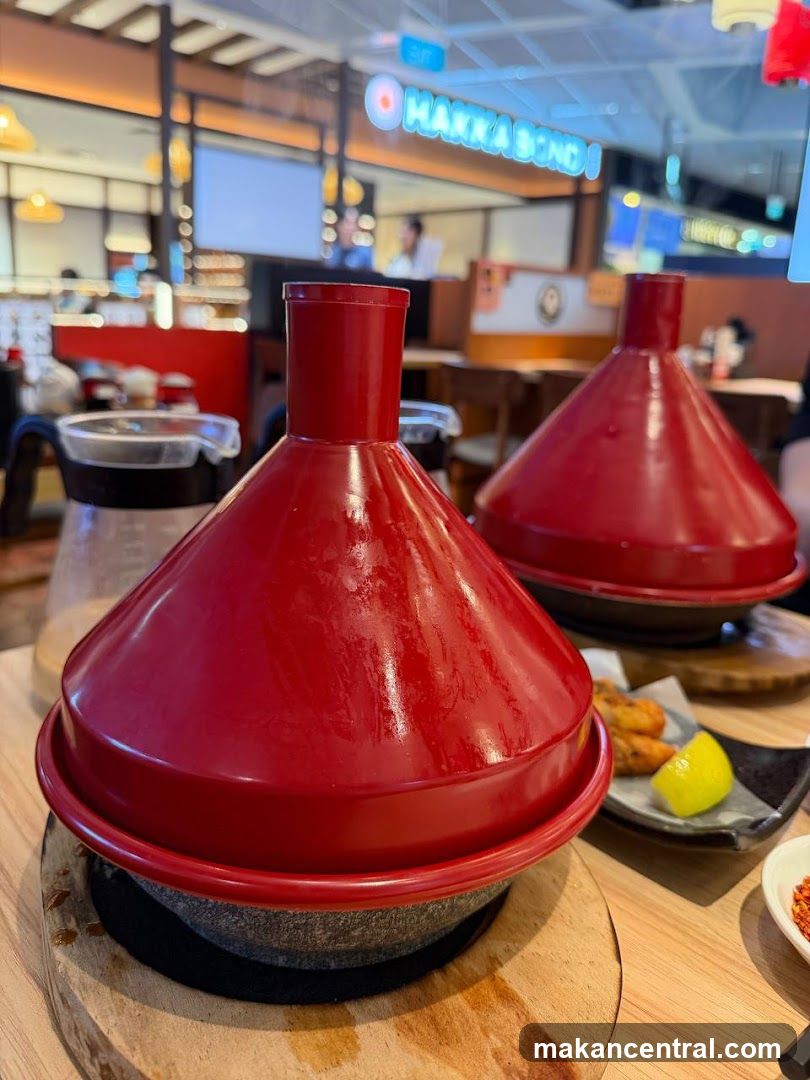 Restaurant Interior with Red Tagine Dishes