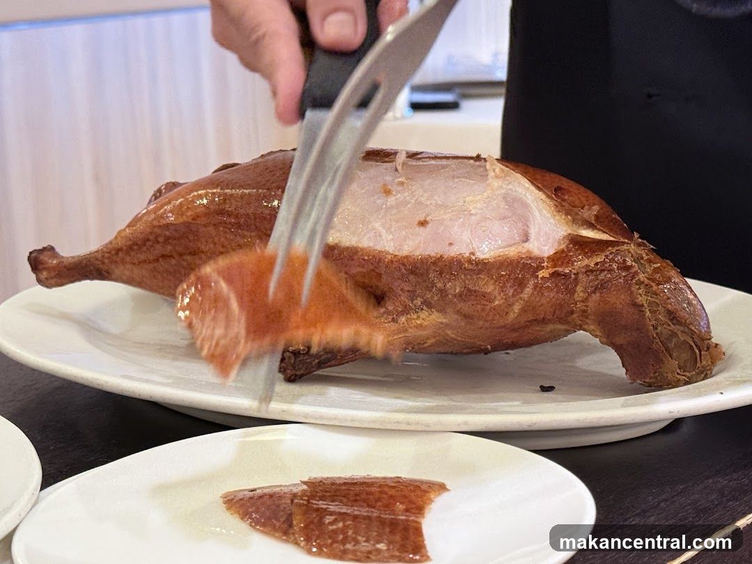 Roasted Duck Being Sliced