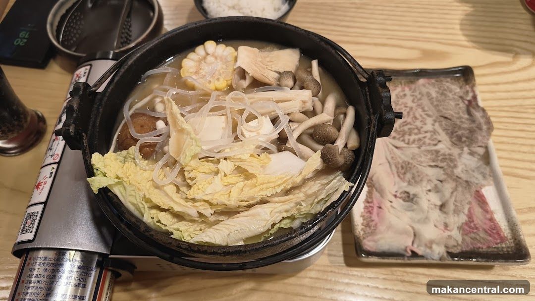 Hot pot meal on wooden table