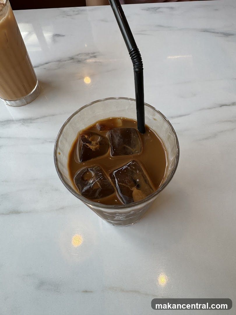 Iced coffee on marble table