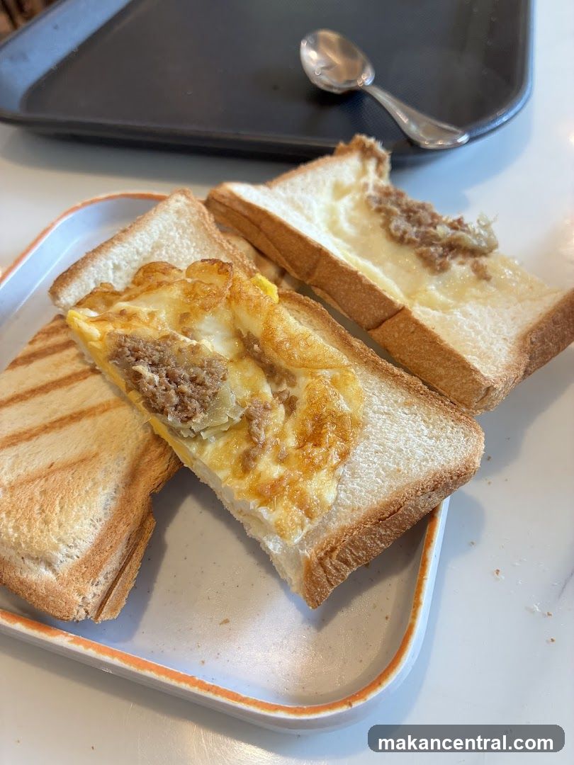 Toasted bread with egg and minced meat
