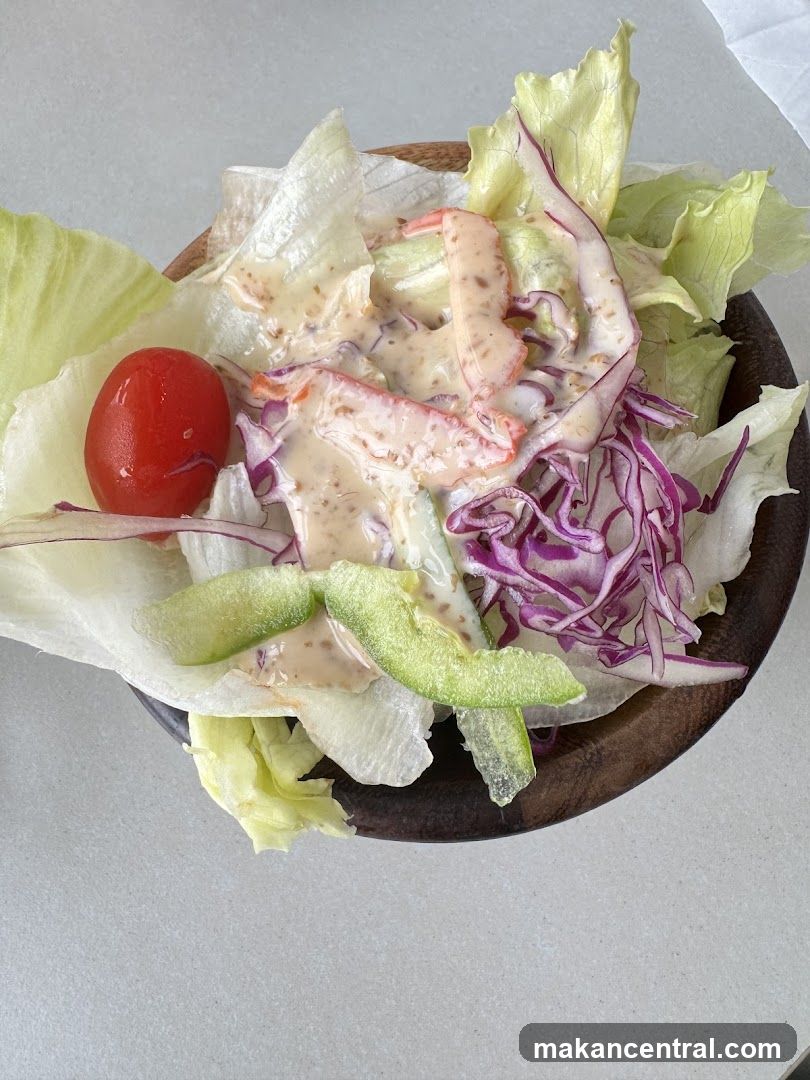 Salad in wooden bowl