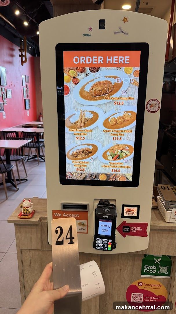 Self-order kiosk in restaurant interior