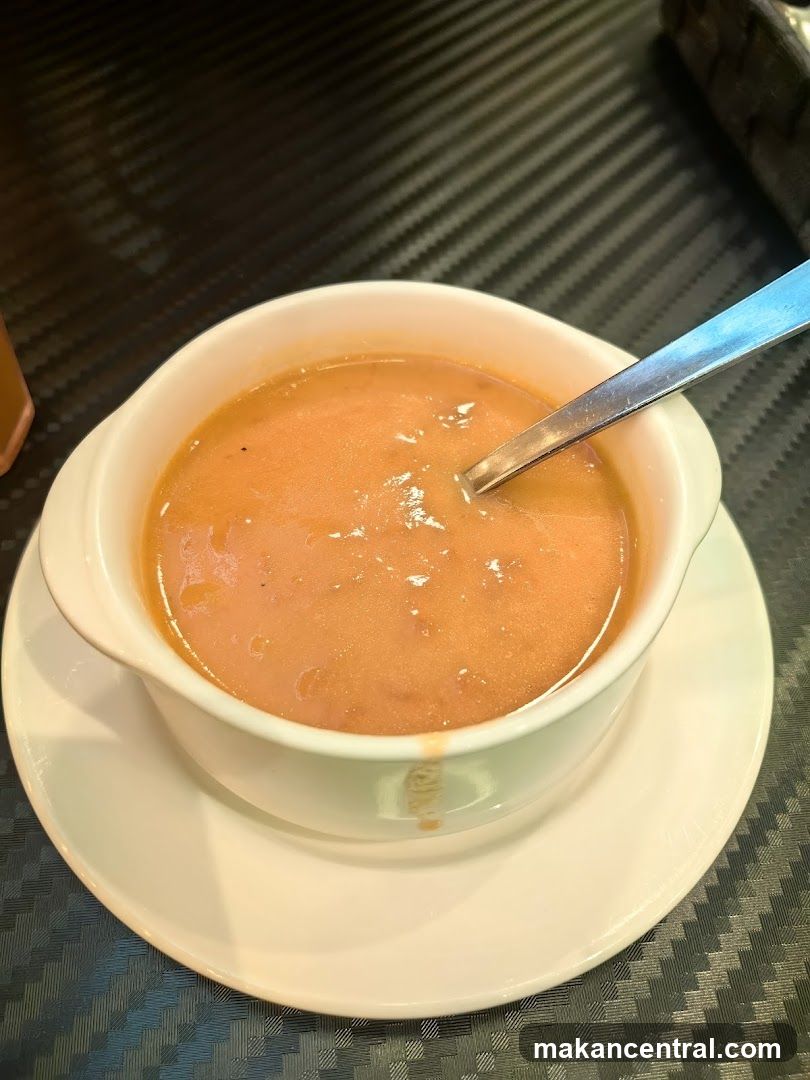 Soup in bowl with spoon