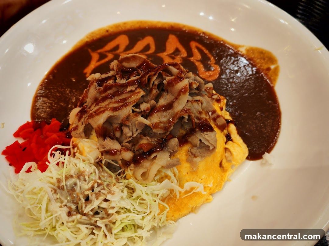 Omelette dish with sauce and toppings