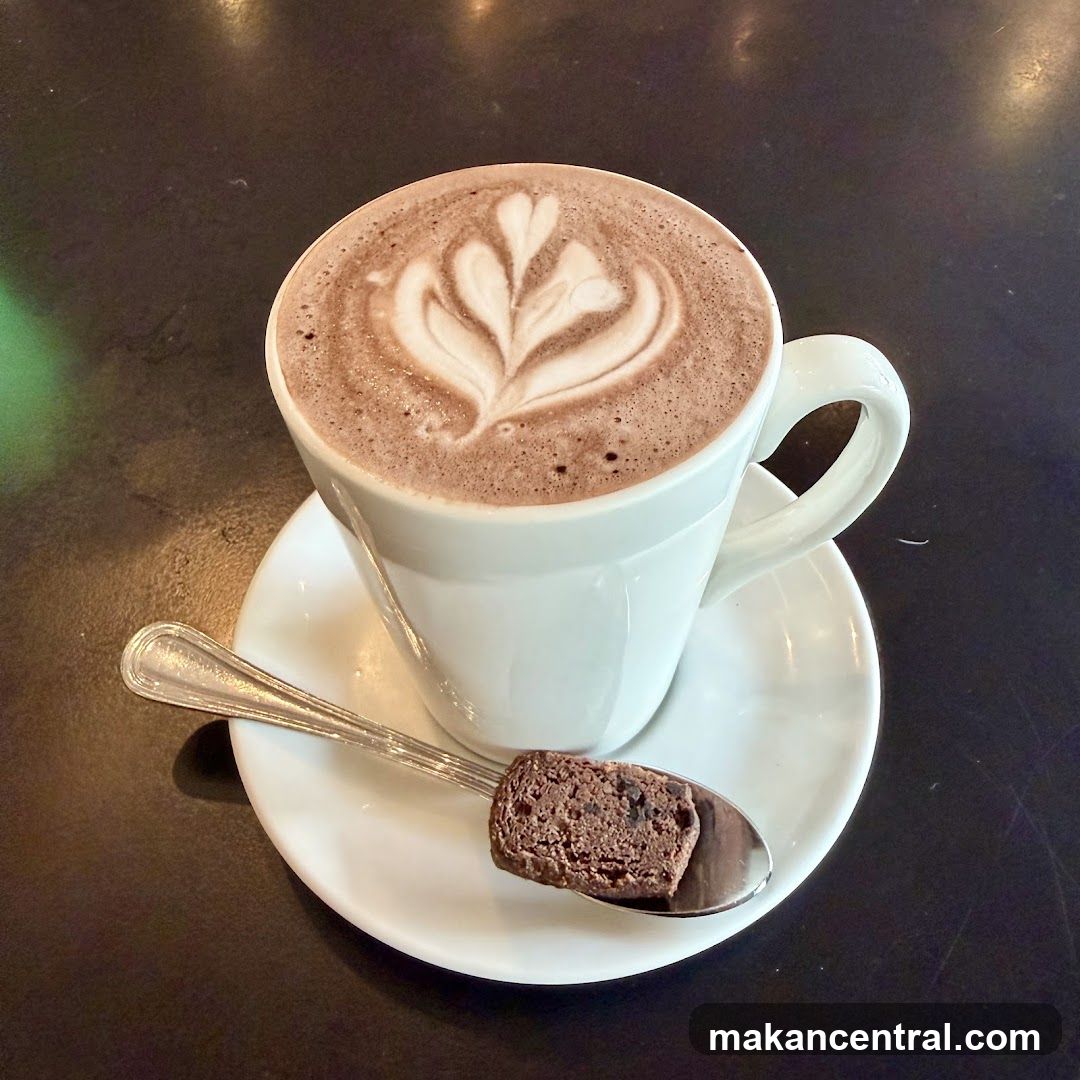 Coffee with Latte Art and Chocolate Cookie