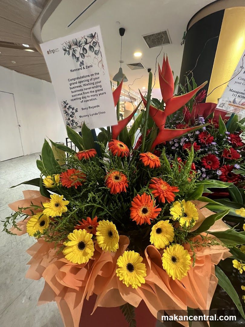 Floral Arrangement with Congratulatory Card