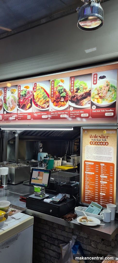 Food stall interior with counter and signage