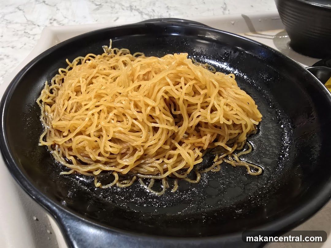 Noodles in black bowl