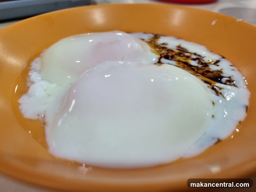 Fried Eggs on Orange Plate