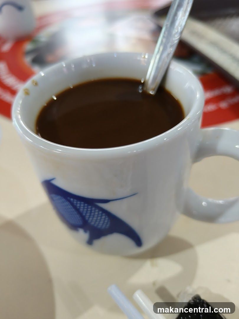 Coffee Cup with Spoon