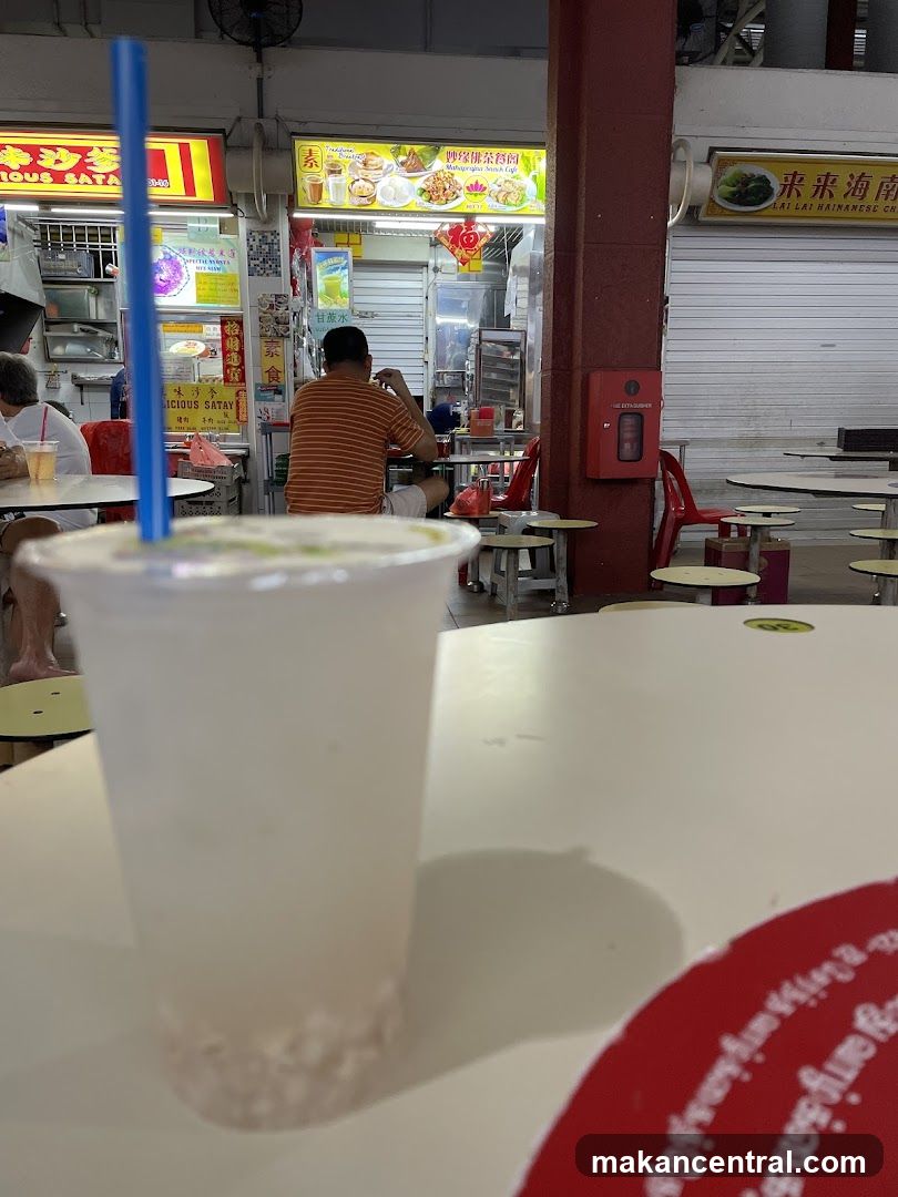 Food court interior with patrons and signage