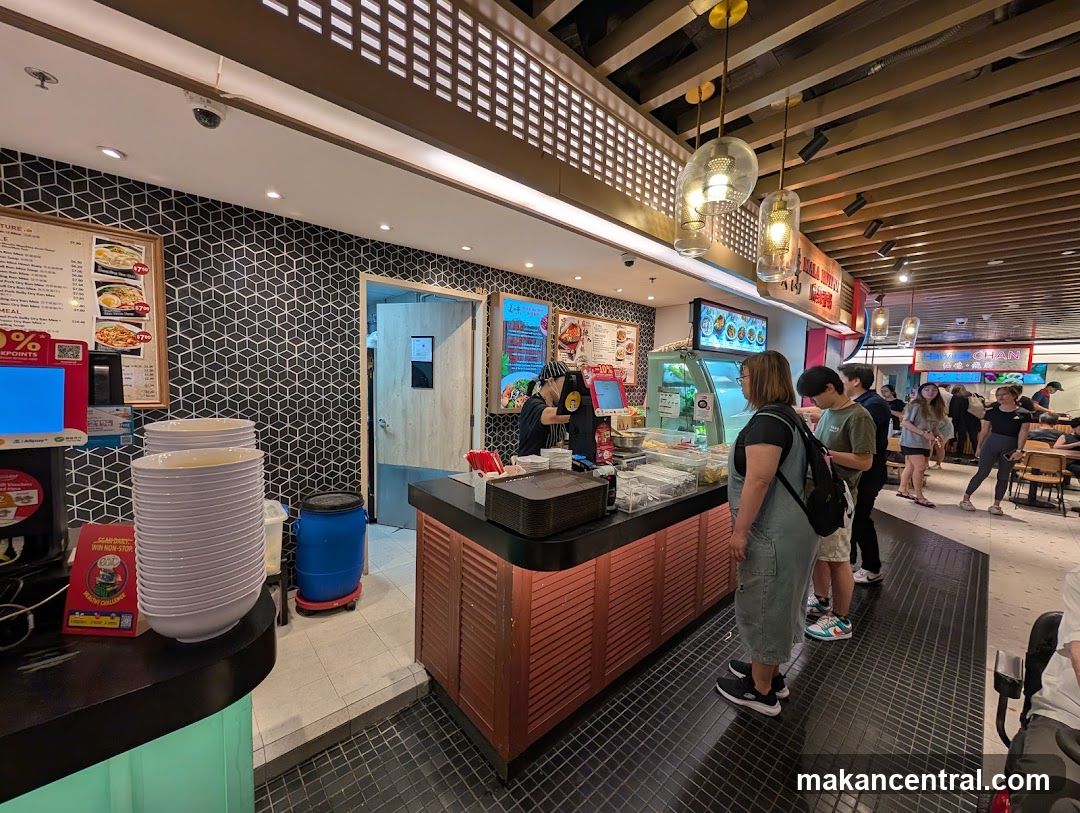 Food court interior with customers and staff