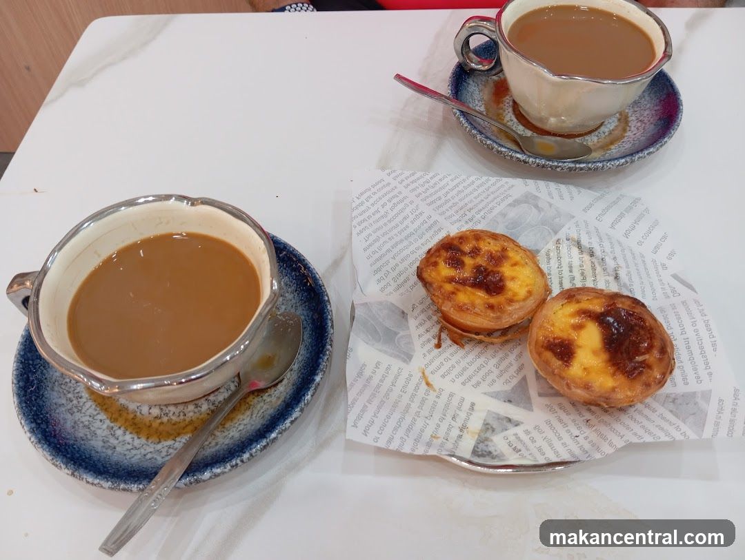 Table setting with coffee and pastries