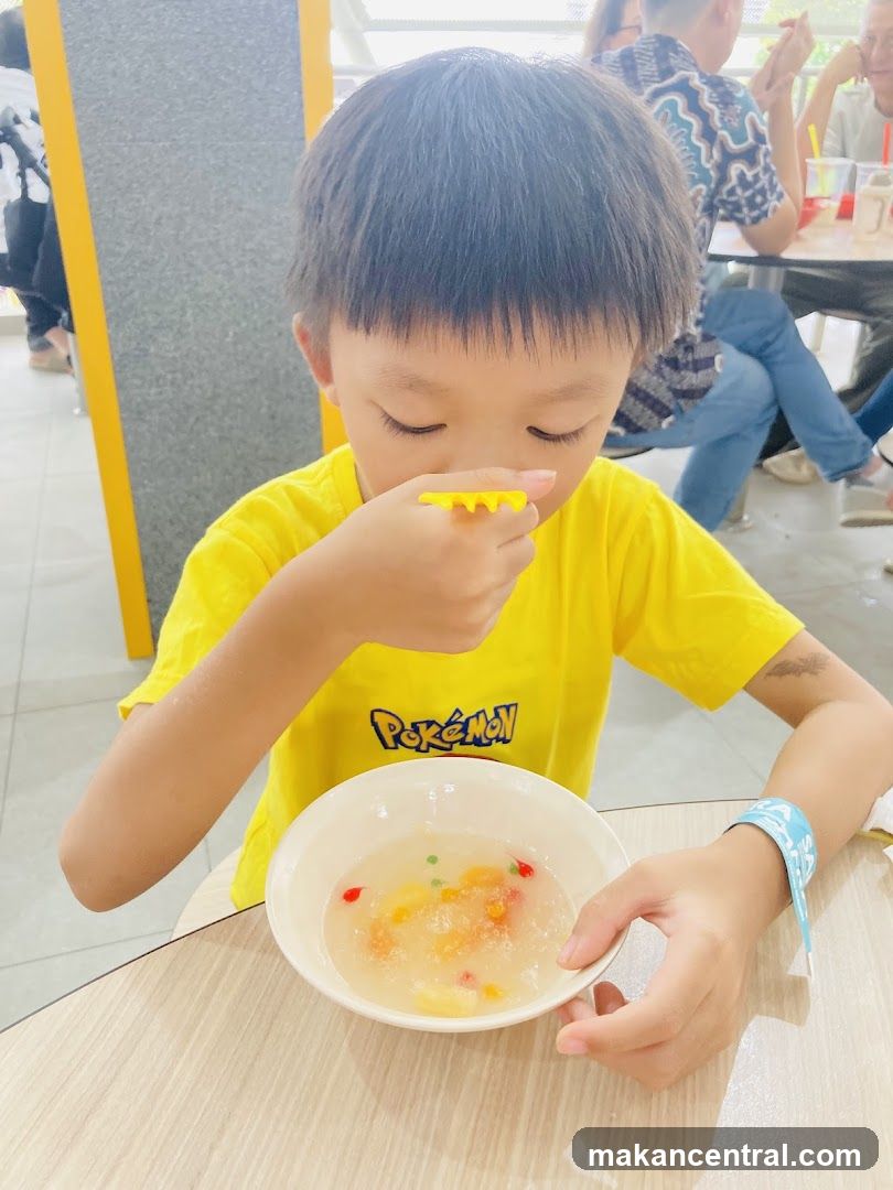 Child eating dessert at restaurant