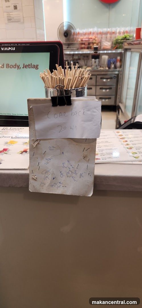 Counter with chopsticks and handwritten note